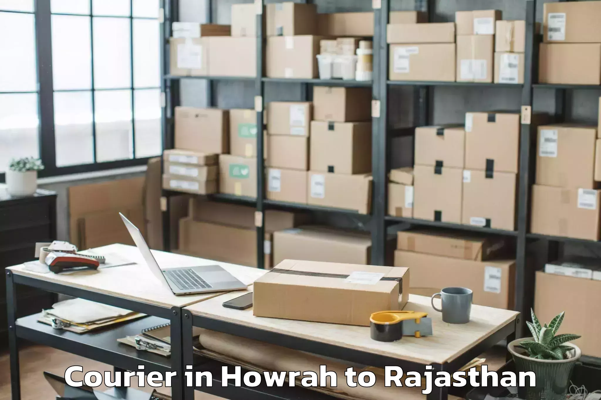 Leading Howrah to Ratangarh Churu Courier Provider